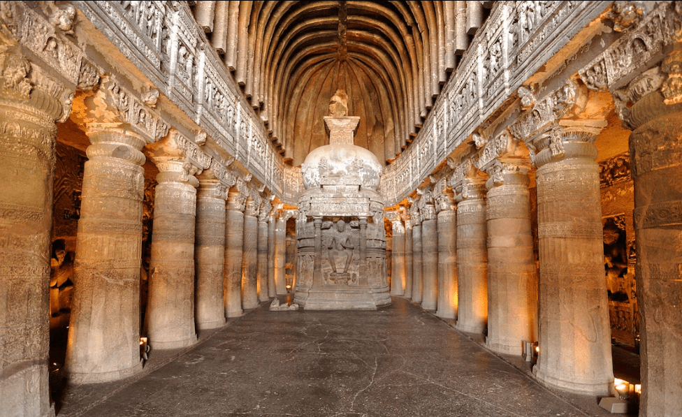 Ajanta Caves interior from the Vakataka period, showing ornate pillars and Buddha shrine patronized by the Vakataka dynasty