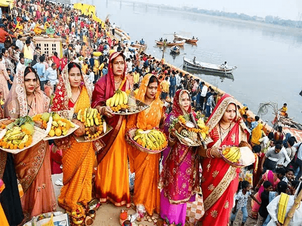 Traditional Chhath Puja celebration honoring Sun God with offerings at waterbanks