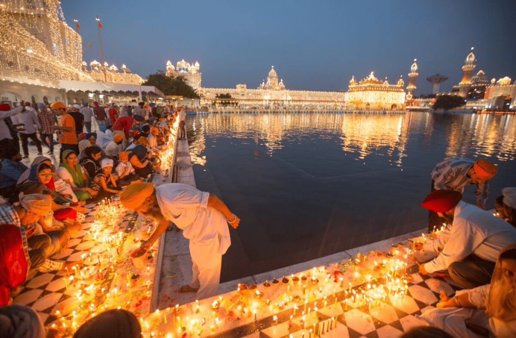 People lighting diyas during Diwali, showing the festival’s living relevance in modern India